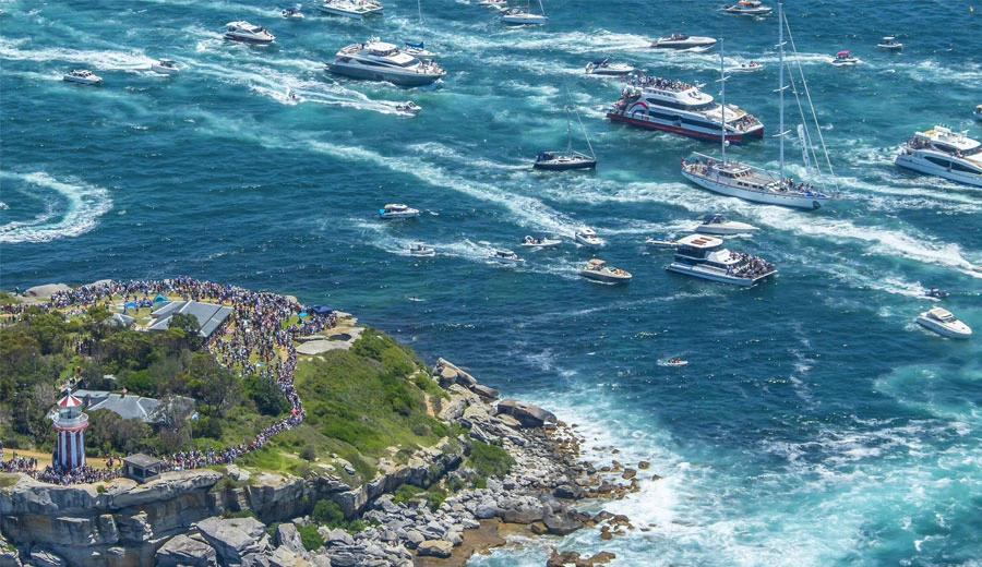 Family enjoying Boxing Day boat hire on Sydney Harbour
